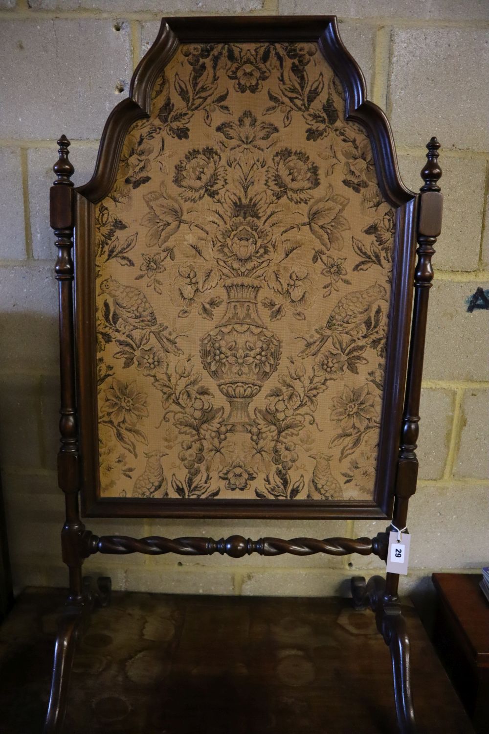 A 1920s mahogany firescreen, width 60cm, height 111cm